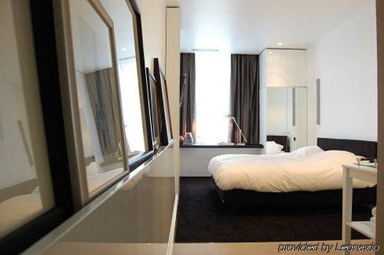 Hotel Les Nuits Amberes Habitación foto